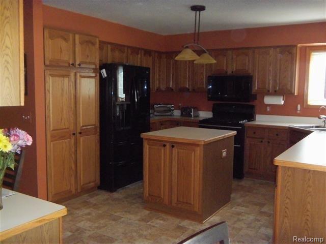 8112 Lee Road Brighton, MI 48116 - Photo 12 of 30 Kitchen-newer flooring.JPG