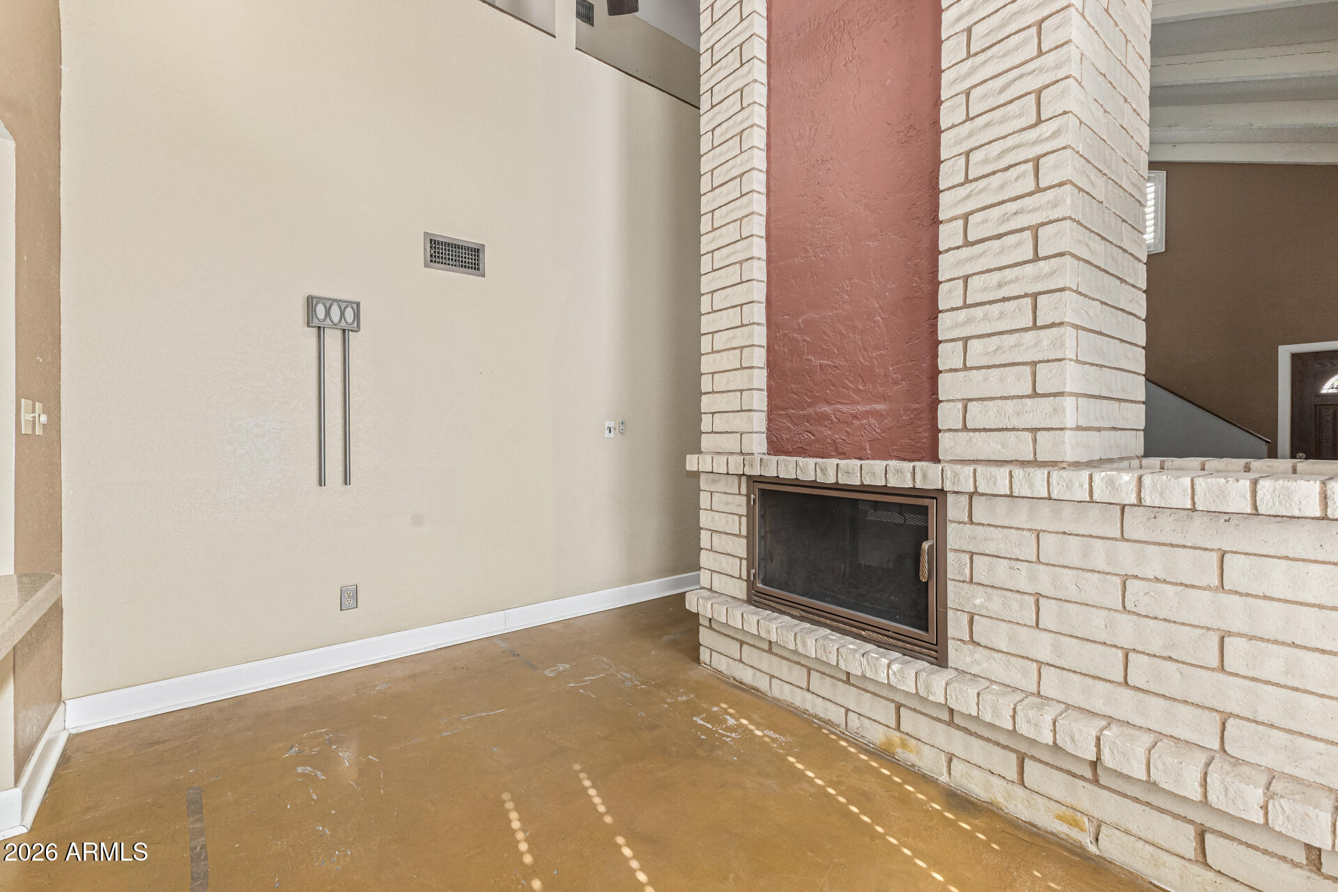 2930 North 22nd Place Phoenix, AZ 85016 - Photo 15 of 41 a view of a livingroom with an empty space and a fireplace