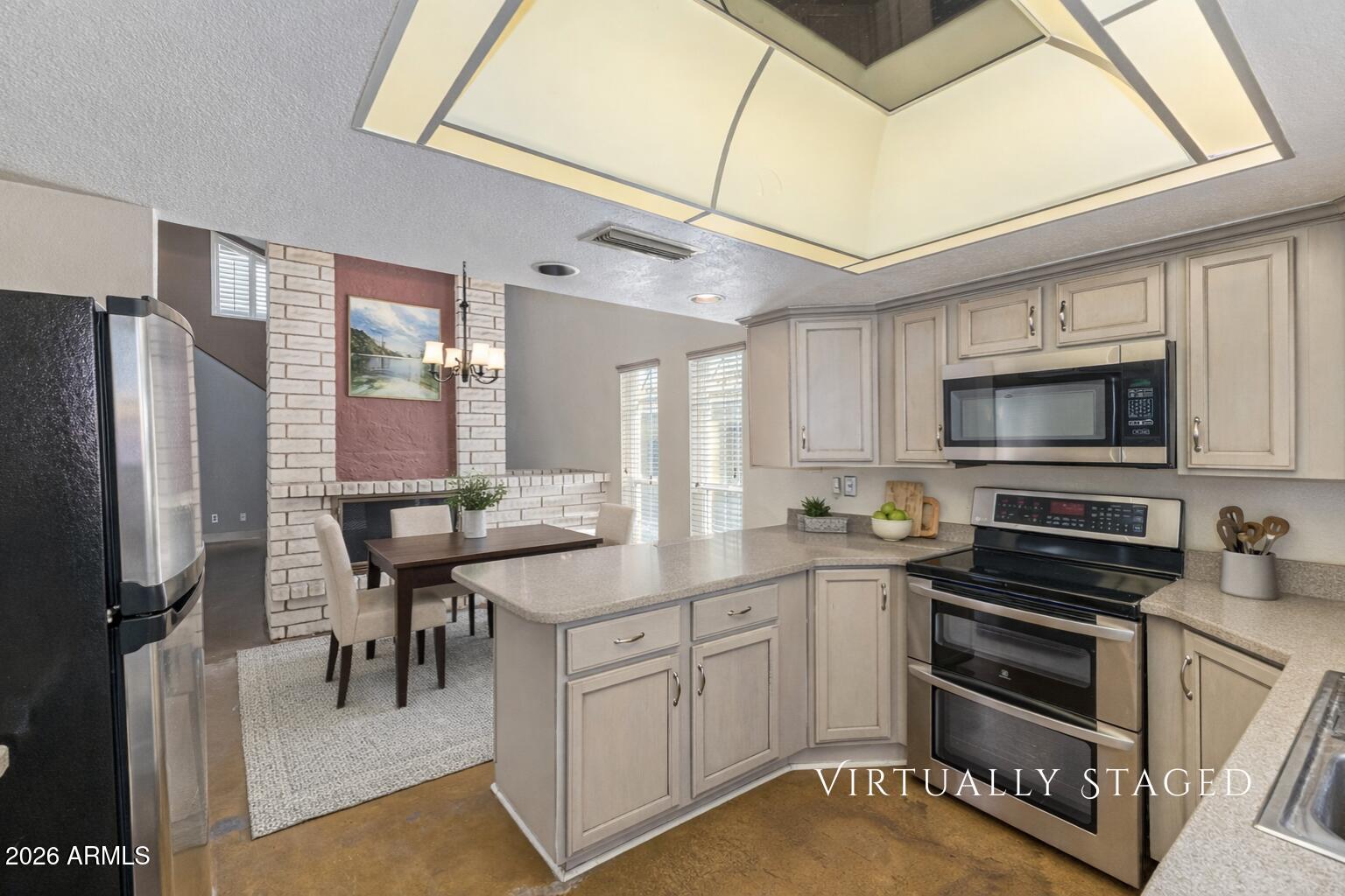 2930 North 22nd Place Phoenix, AZ 85016 - Photo 17 of 41 a kitchen with cabinets appliances and a counter top space