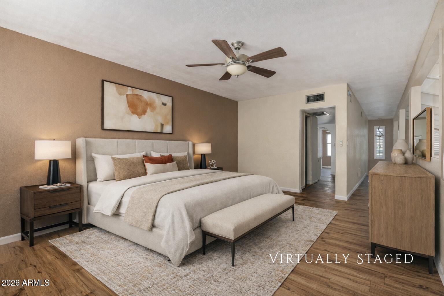 2930 North 22nd Place Phoenix, AZ 85016 - Photo 19 of 41 a bedroom with a bed and a painting on the wall