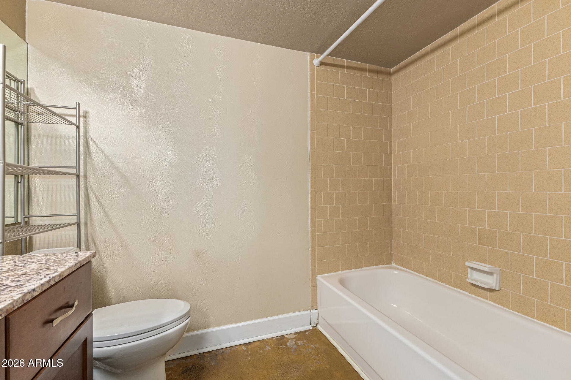 2930 North 22nd Place Phoenix, AZ 85016 - Photo 34 of 41 a bathroom with a granite countertop sink toilet and bathtub