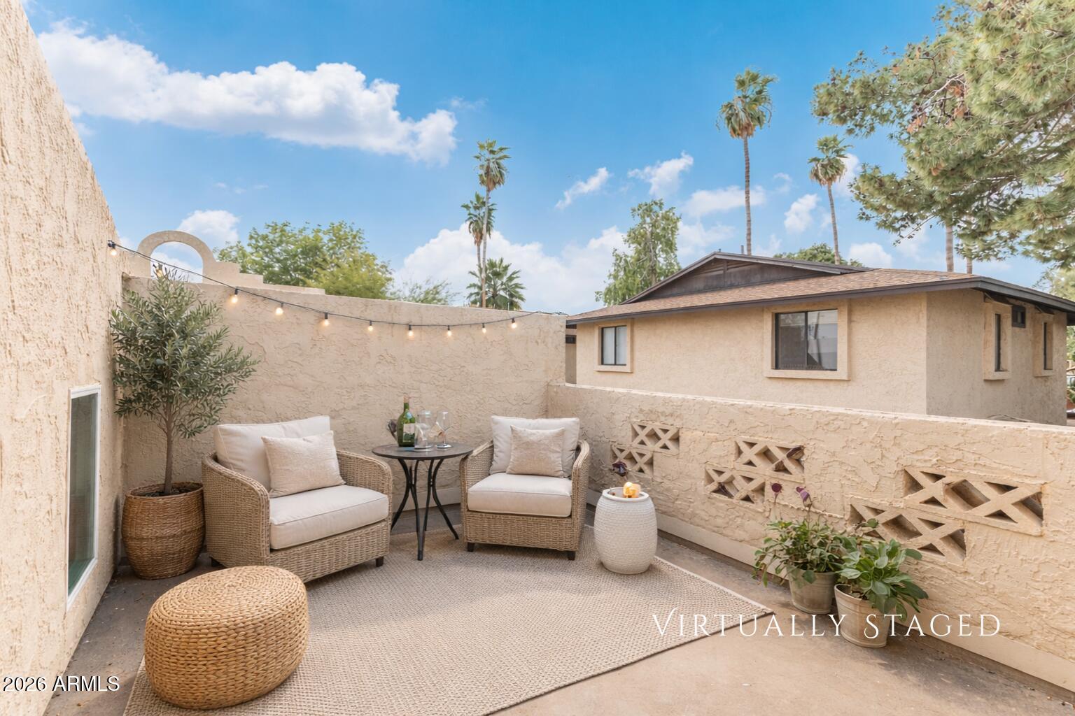 2930 North 22nd Place Phoenix, AZ 85016 - Photo 37 of 41 a balcony with couple of white chairs