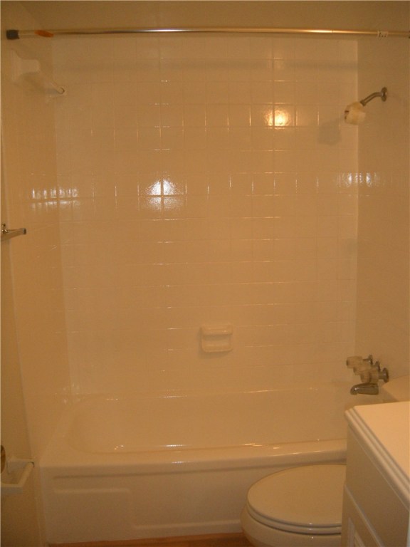 6910 Hart Lane, Unit 502 Austin, TX 78731 - Photo 15 of 16 a bathroom with a toilet and a shower