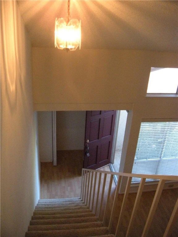 6910 Hart Lane, Unit 502 Austin, TX 78731 - Photo 5 of 16 a view of balcony with furniture and a window