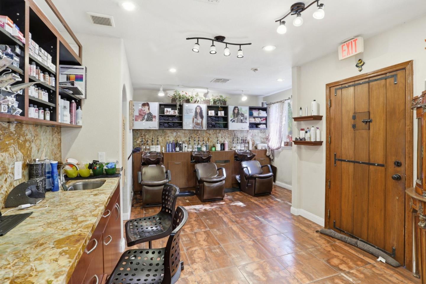3630 San Felipe Road San Jose, CA 95135 - Photo 13 of 22 a kitchen with sink refrigerator and cabinets