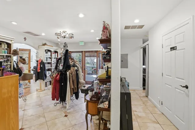 a view of a workspace with furniture