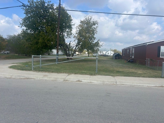 Tbd Tbd Pecan Street Granger, TX 76530 - Photo 1 of 4 a view of a golf course with a lake view