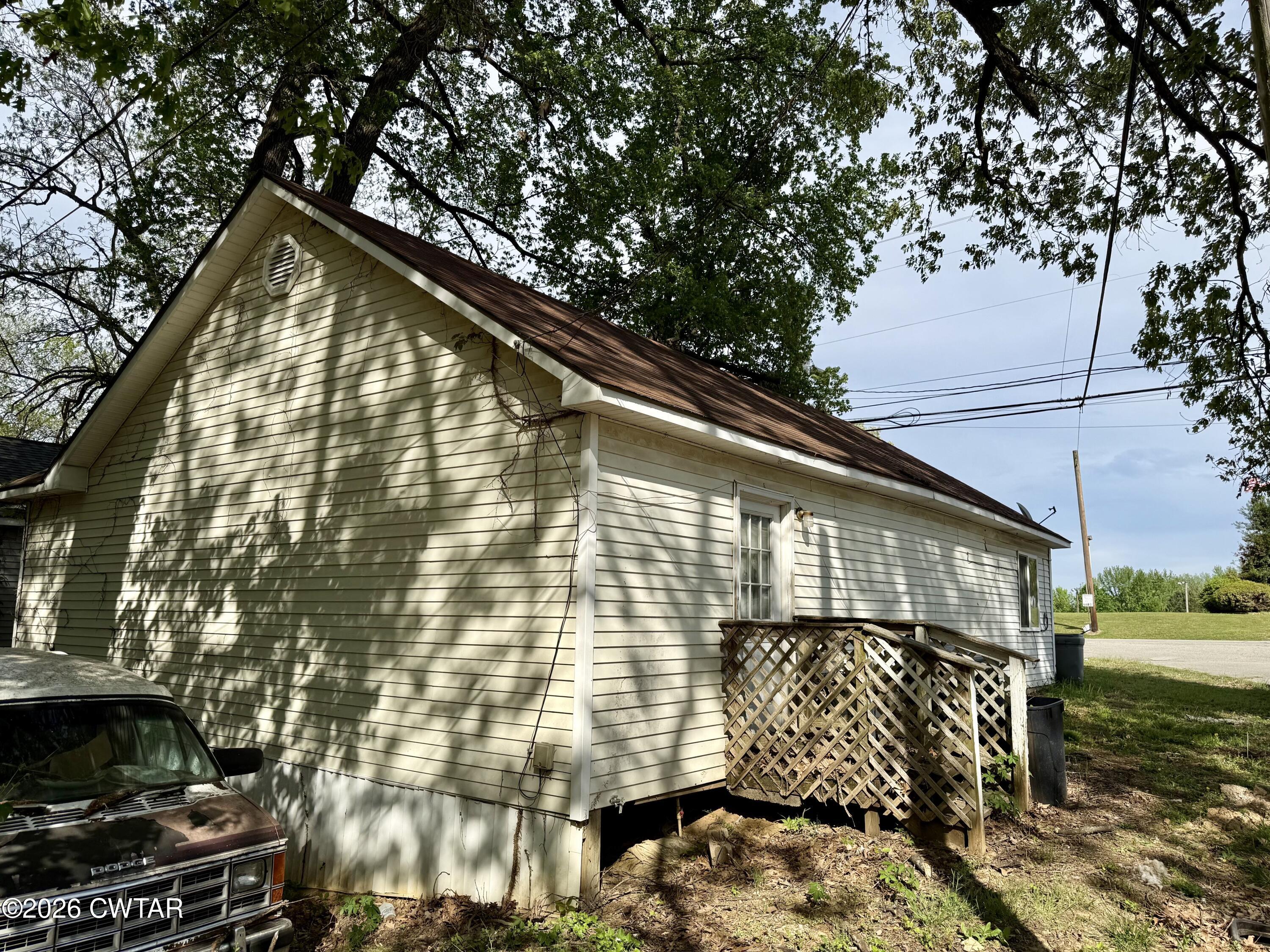 7581 Highway 189 Friendship, TN 38034 - Photo 8 of 8 a view of backyard of the house
