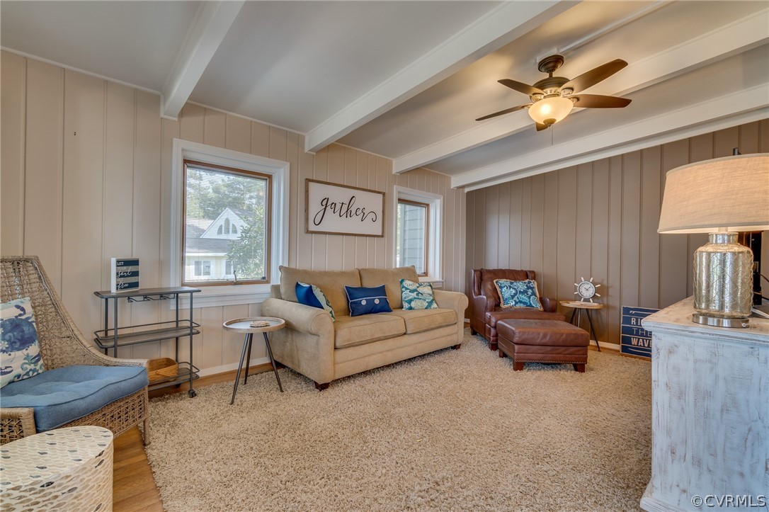 6279 Holly Trail Gloucester, VA 23061 - Photo 21 of 45 a living room with furniture and a chandelier