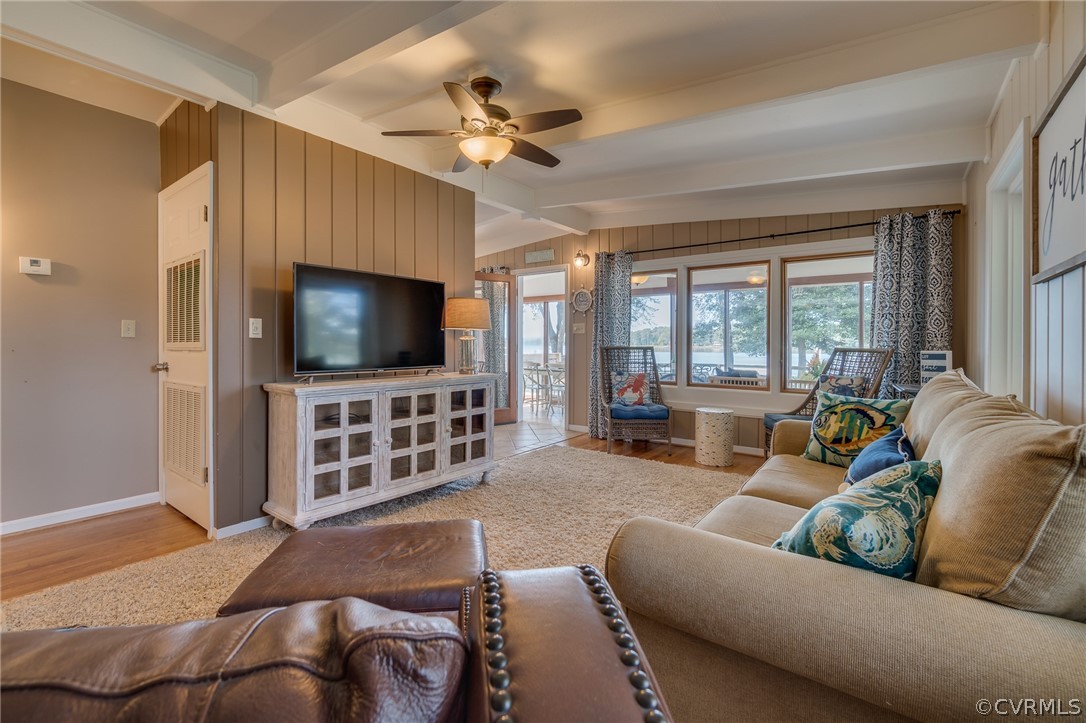 6279 Holly Trail Gloucester, VA 23061 - Photo 23 of 45 a living room with furniture and a flat screen tv