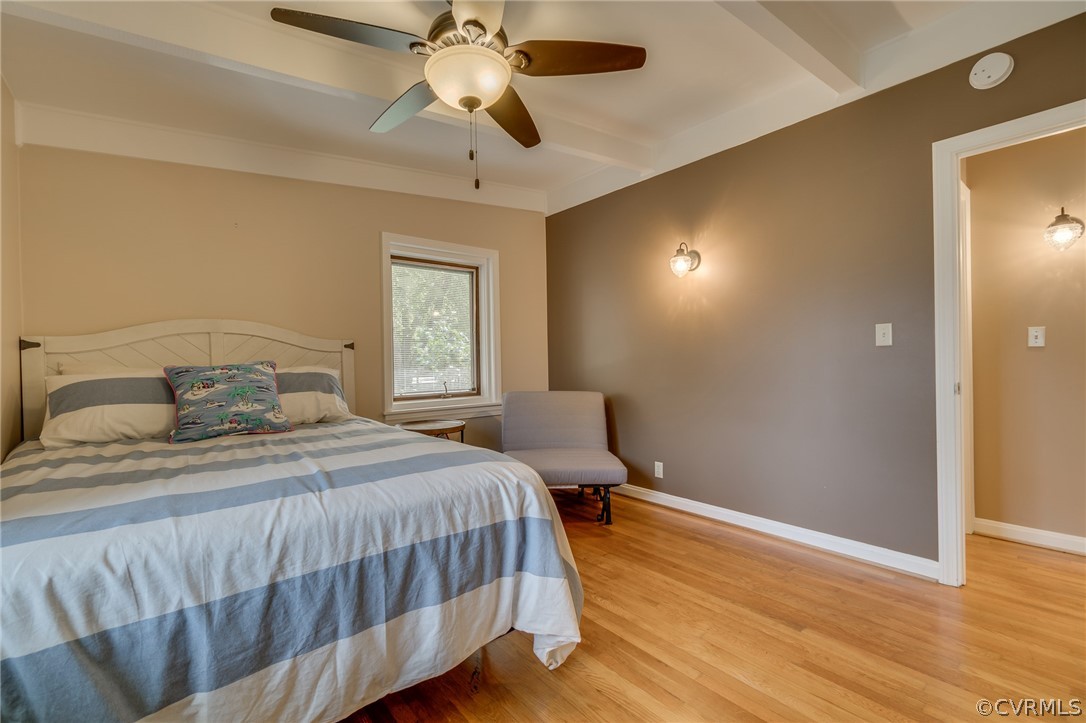 6279 Holly Trail Gloucester, VA 23061 - Photo 25 of 45 a bedroom with a bed and a chandelier