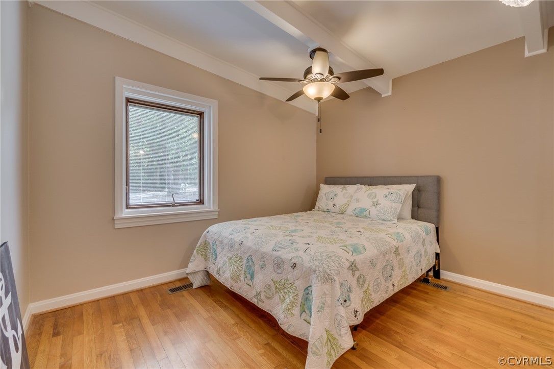 6279 Holly Trail Gloucester, VA 23061 - Photo 26 of 45 a bedroom with a bed and a window