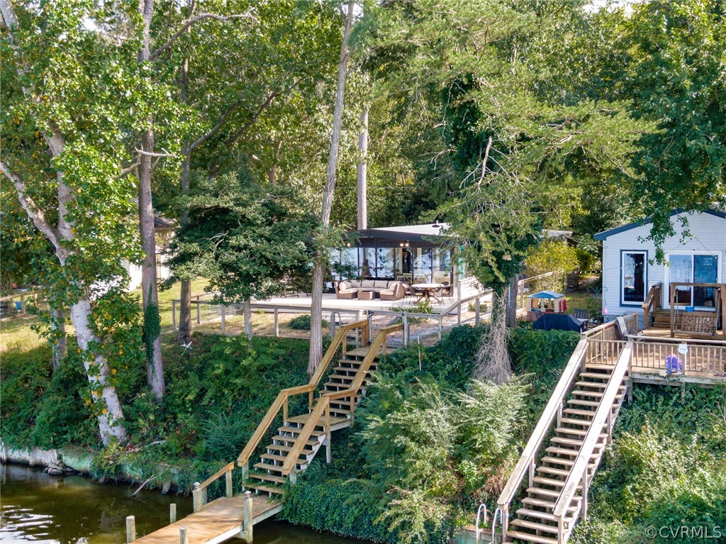 6279 Holly Trail Gloucester, VA 23061 - Photo 34 of 45 a front view of a house with a yard