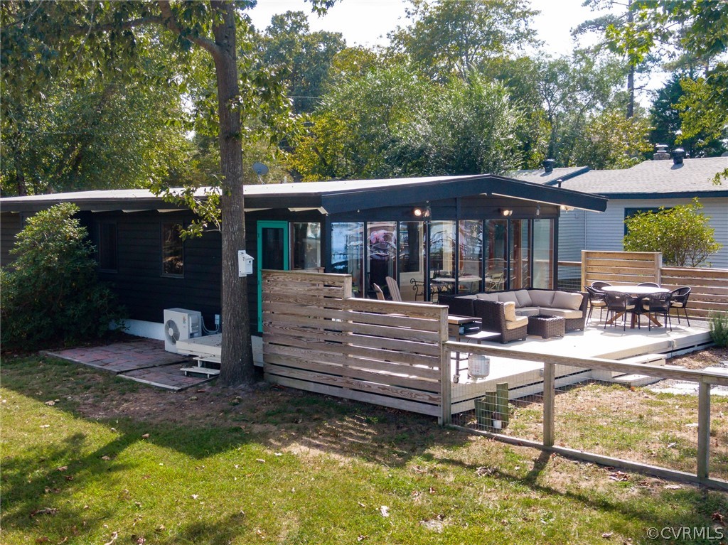 6279 Holly Trail Gloucester, VA 23061 - Photo 35 of 45 a view of a house with backyard porch and sitting area