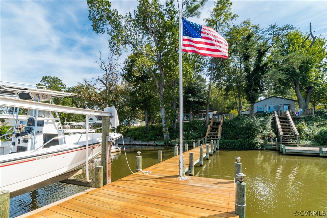 6279 Holly Trail Gloucester, VA 23061 - Photo 36 of 45 a view of a swimming pool with a lounge chairs