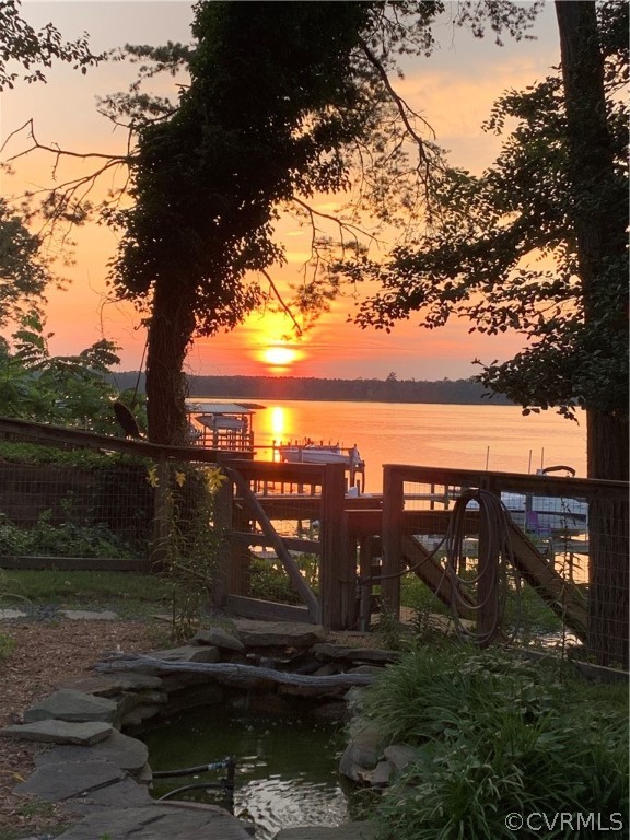 6279 Holly Trail Gloucester, VA 23061 - Photo 43 of 45 a view of a lake in middle of a city