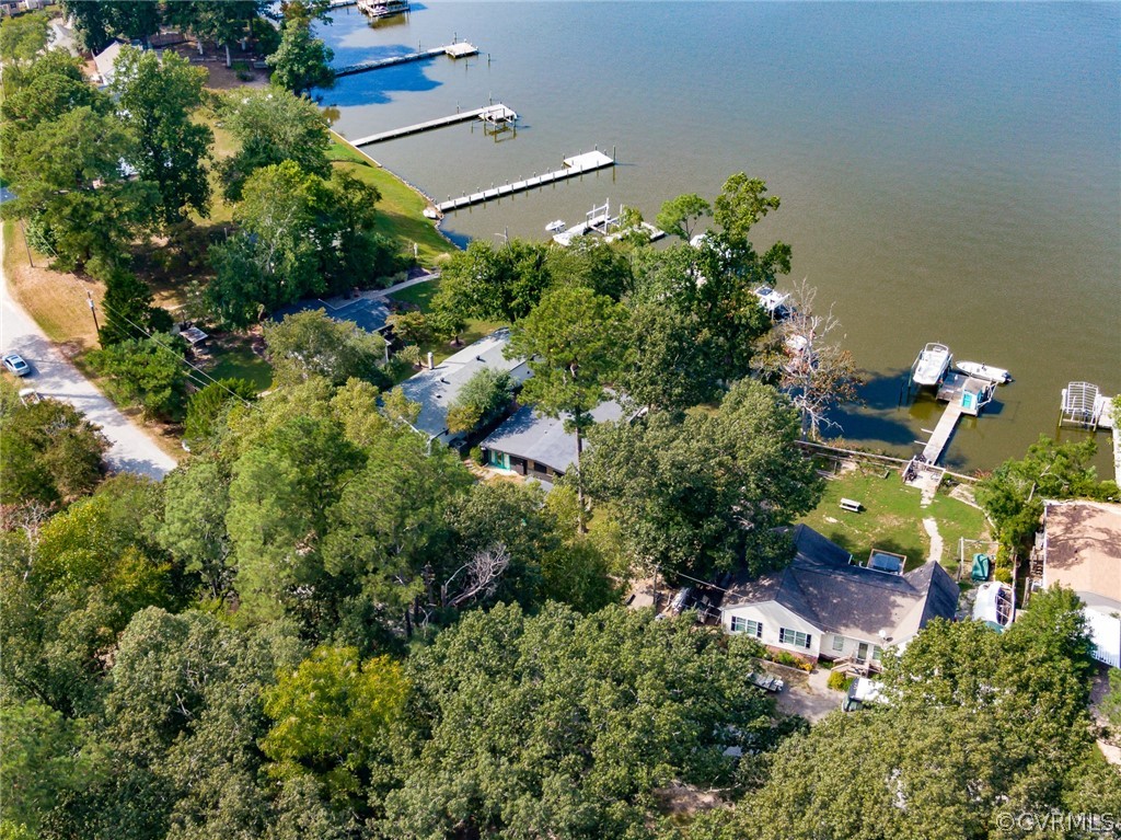 6279 Holly Trail Gloucester, VA 23061 - Photo 5 of 45 an aerial view of a house with a yard and lake view