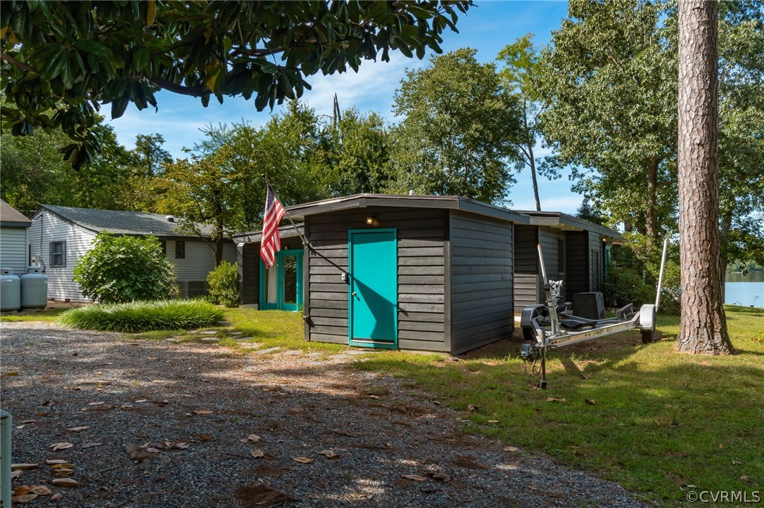 6279 Holly Trail Gloucester, VA 23061 - Photo 9 of 45 a view of a house with a yard