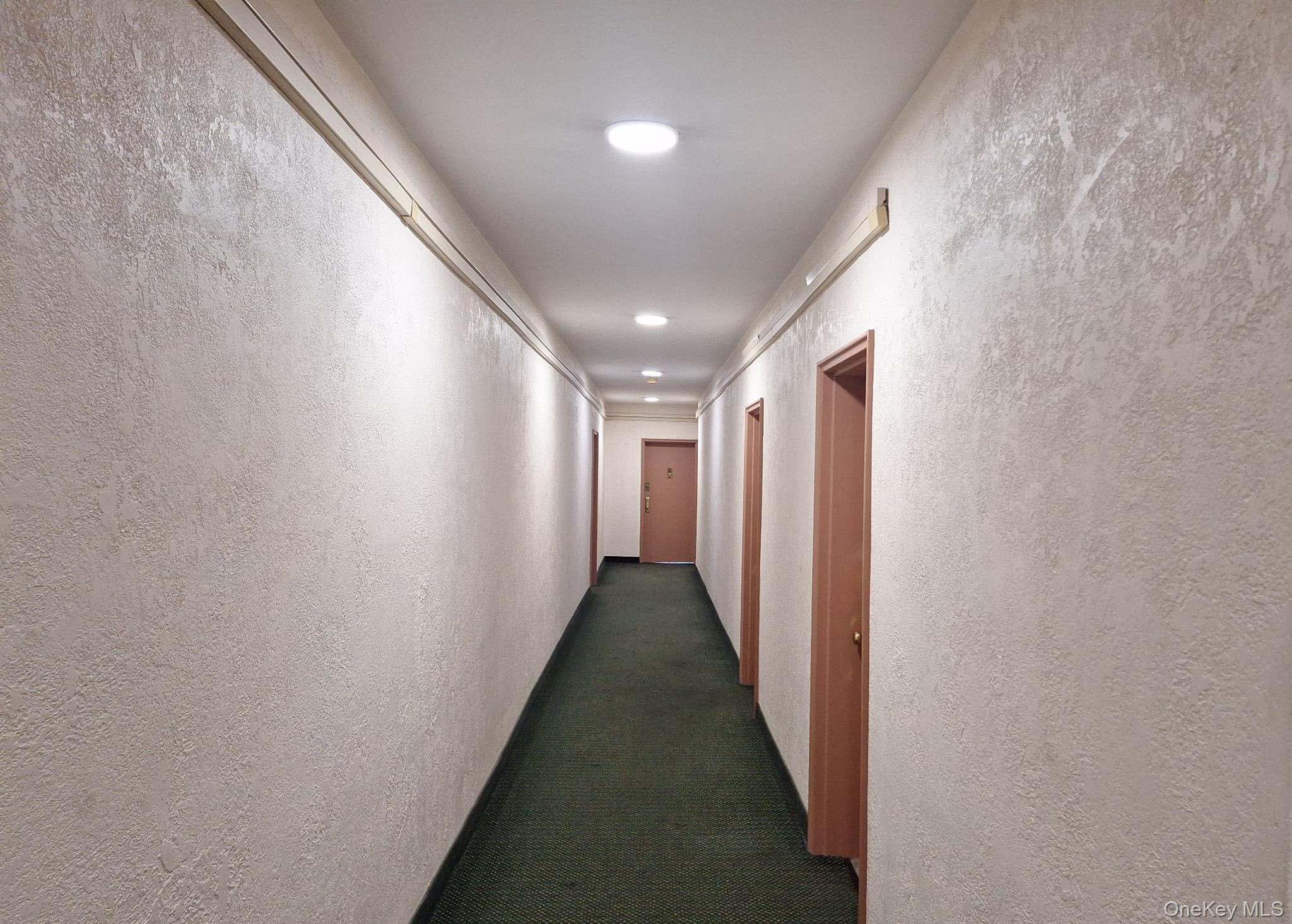 3475 Greystone Avenue, Unit 7E Bronx, NY 10463 - Photo 2 of 12 a view of a hallway