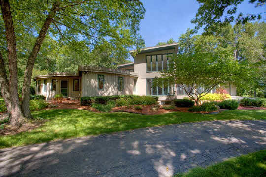 15925 Sharp Road Rockton, IL 61072 - Photo 2 of 6 a front view of a house with a yard and porch