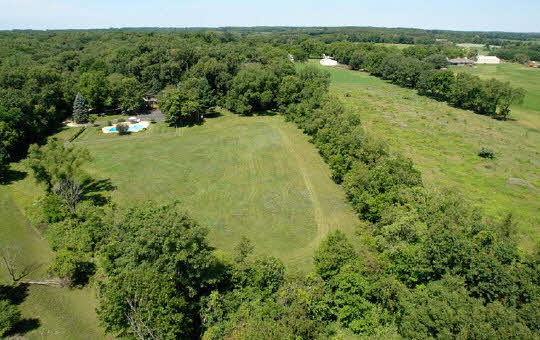 15925 Sharp Road Rockton, IL 61072 - Photo 6 of 6 a view of a yard with a tree