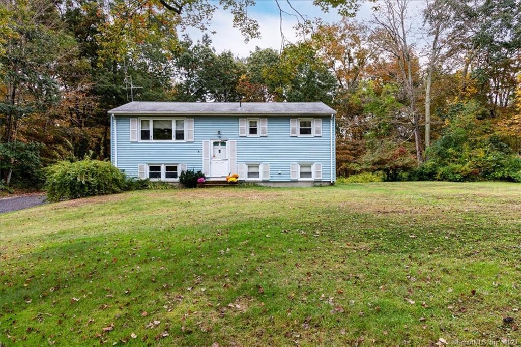 384 Warrenville Road Mansfield, CT 06250 - Photo 1 of 1 a view of a house with a yard