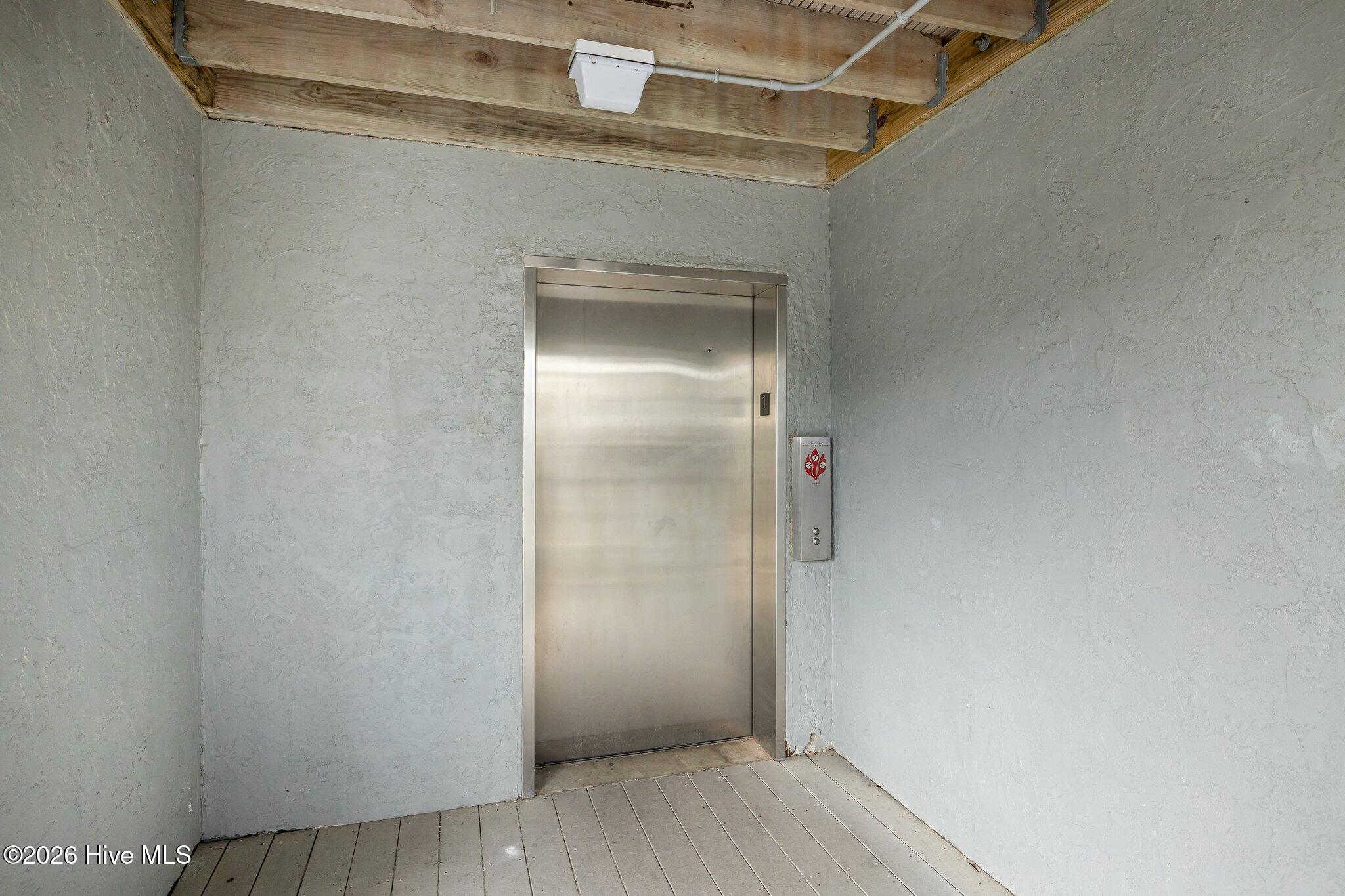 855 Salter Path Road, Unit 108 Indian Beach, NC 28512 - Photo 37 of 54 Unit is next to elevator and staircase.