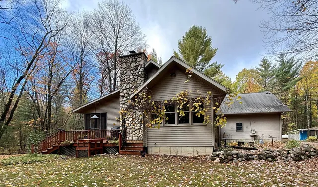 $469,900 | 3973 East Creek Wood Drive, Chase, MI 49623