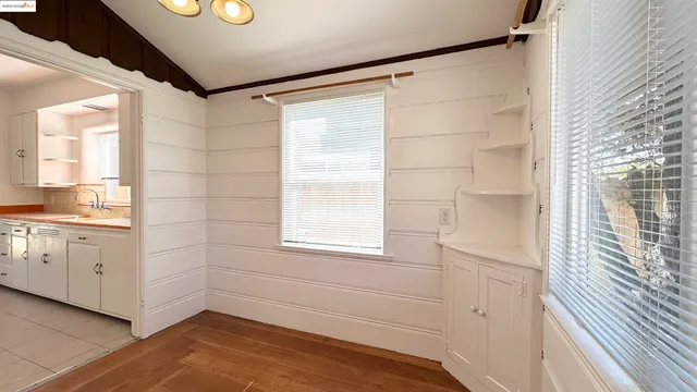 a bathroom with a shower and a sink