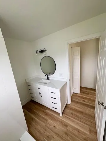 a view of kitchen and cabinets