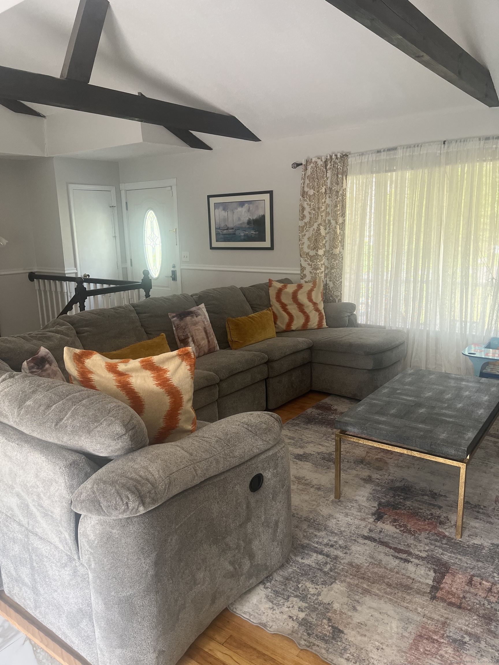 62 Haddad Road Waterbury, CT 06708 - Photo 3 of 15 a living room with furniture and a window