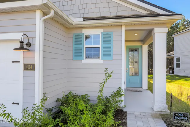 a front view of a house having patio