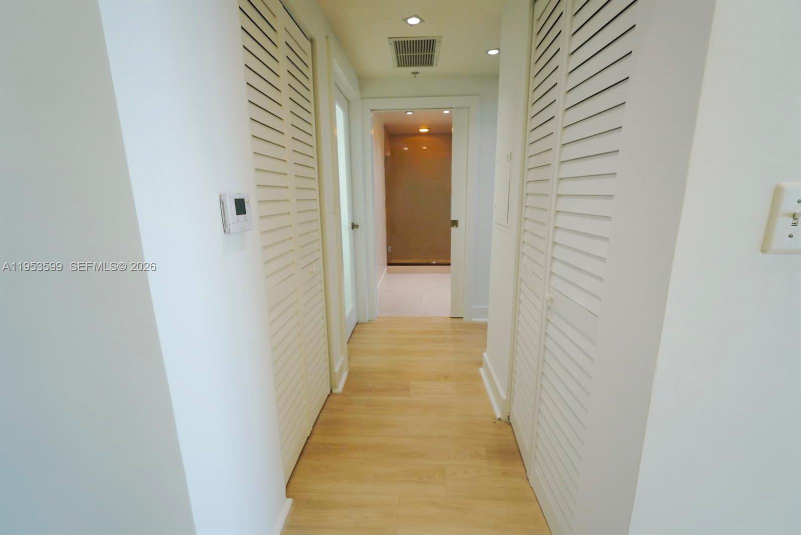 325 South Biscayne Boulevard, Unit 3314 Miami, FL 33131 - Photo 12 of 30 a view of a hallway with a white door
