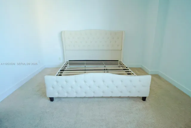 a view of utility room with stairs