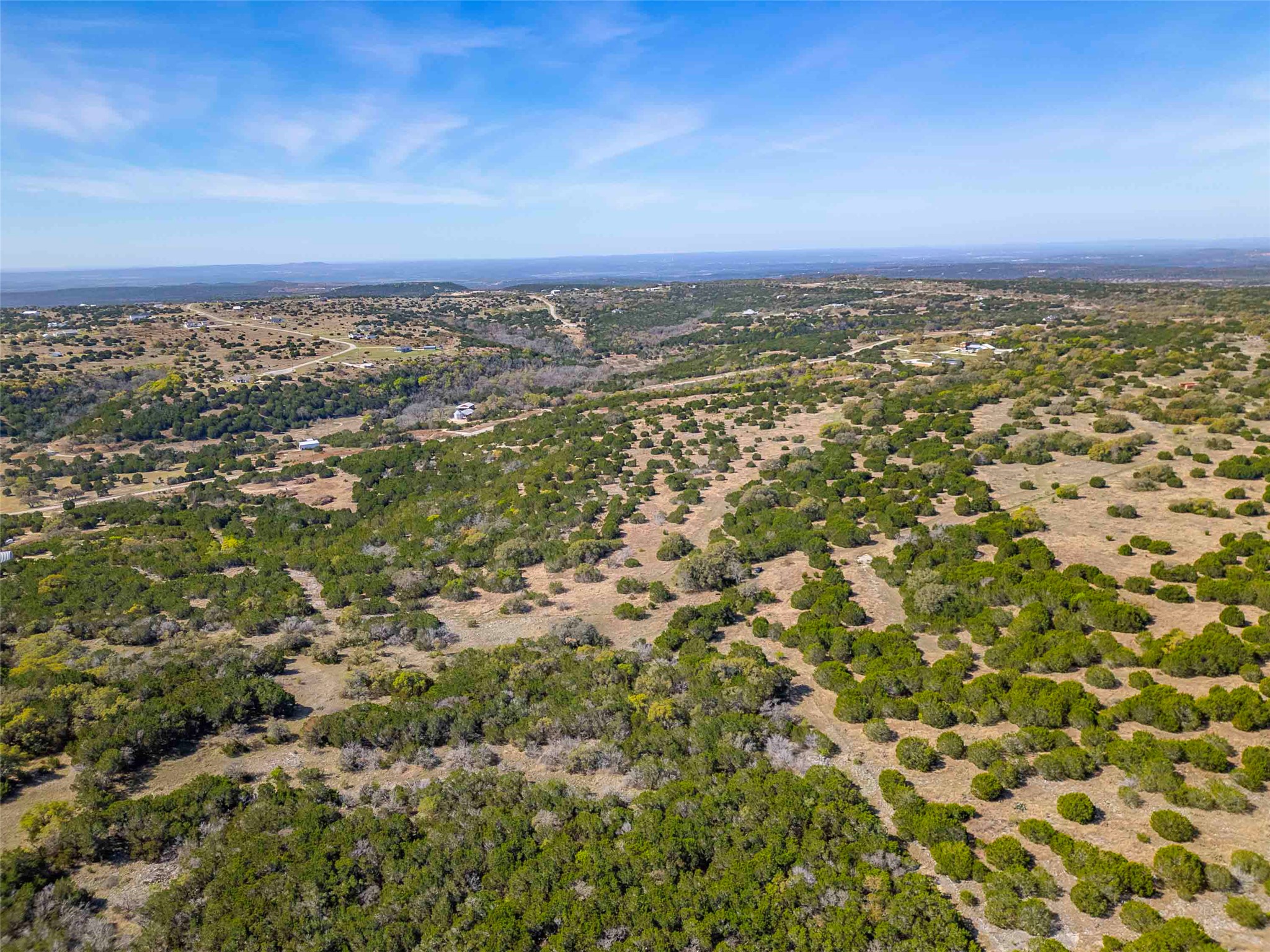 Lot 8 Saddle Ridge Drive Bertram, TX 78605 - Photo 3 of 15 Aerial view from the NE towards the Ranches at Canyon Creek which also has a wildlife management association (WMA) to help reduce taxes
