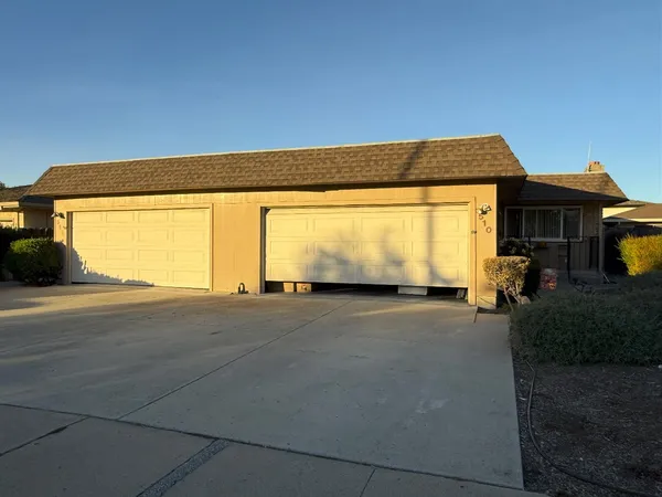 a view of backyard of a house