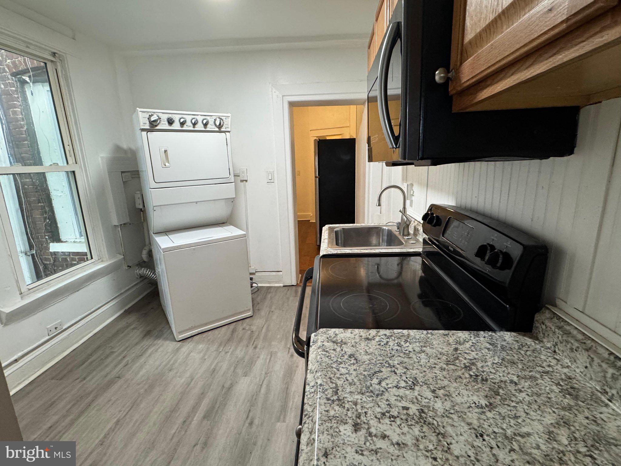 707 Denison Street Baltimore, MD 21229 - Photo 8 of 18 Bright and functional kitchen space.