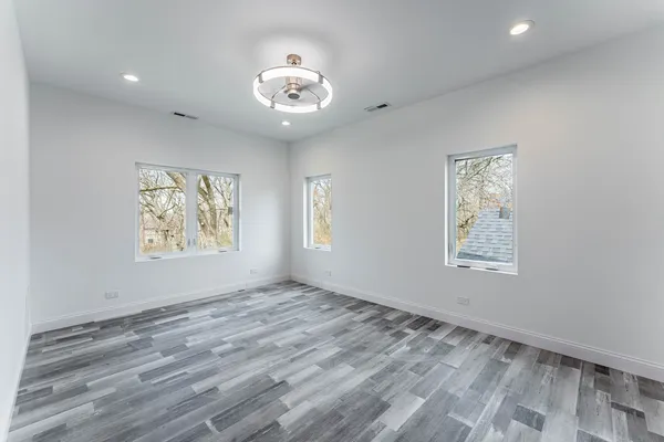 a bathroom with a toilet and a bathtub