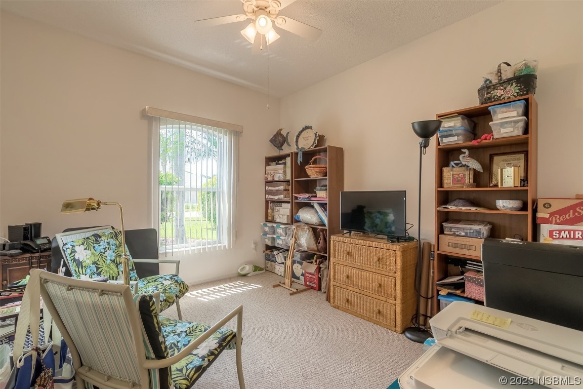313 Mariners Gate Drive Edgewater, FL 32141 - Photo 12 of 55 a living room with furniture and a window