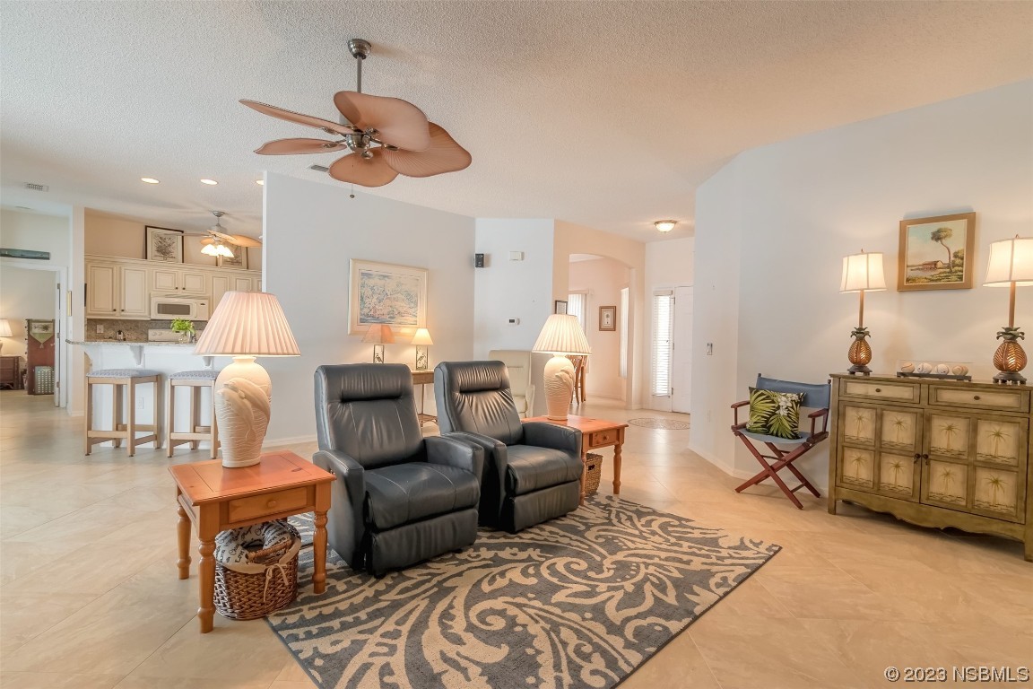 313 Mariners Gate Drive Edgewater, FL 32141 - Photo 29 of 55 a living room with furniture