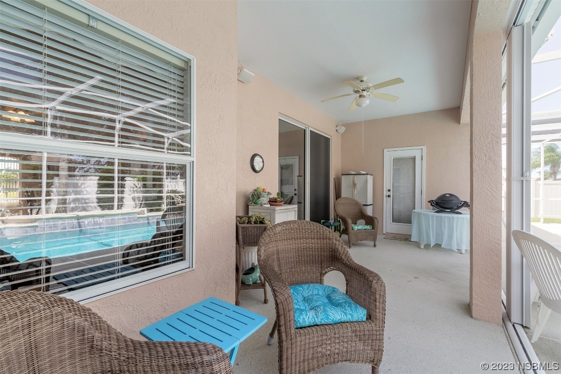 313 Mariners Gate Drive Edgewater, FL 32141 - Photo 39 of 55 a living room with furniture and a window