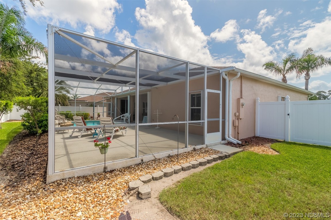 313 Mariners Gate Drive Edgewater, FL 32141 - Photo 44 of 55 a view of a backyard with basket ball court