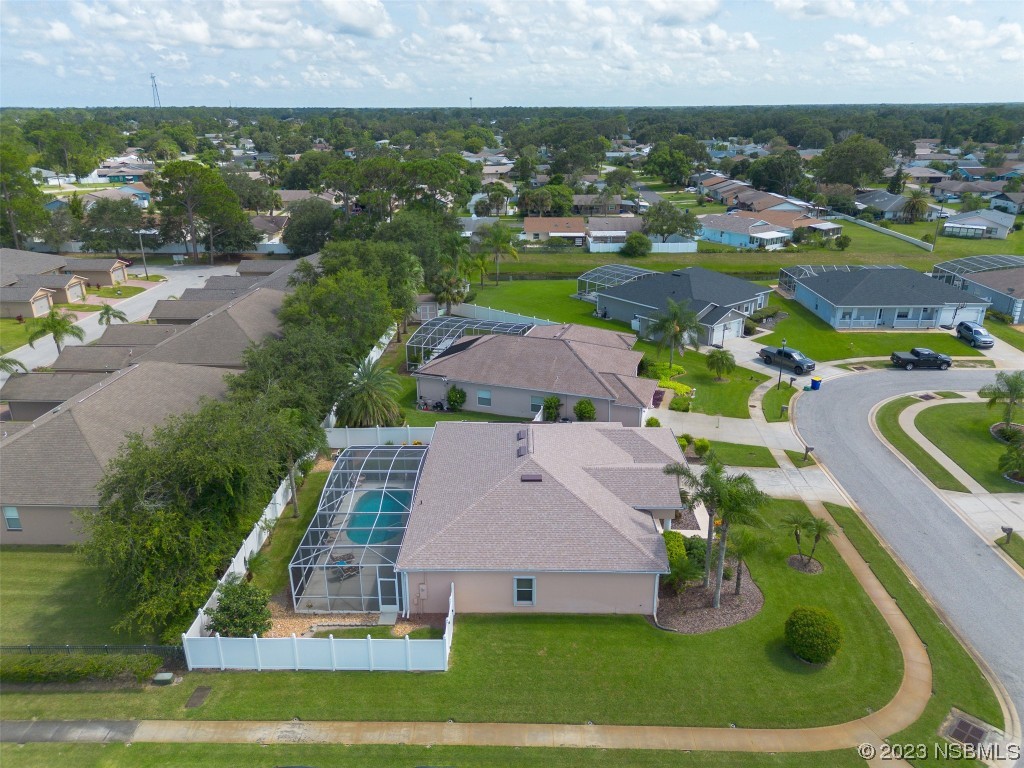 313 Mariners Gate Drive Edgewater, FL 32141 - Photo 48 of 55 an aerial view of residential houses with outdoor space and swimming pool
