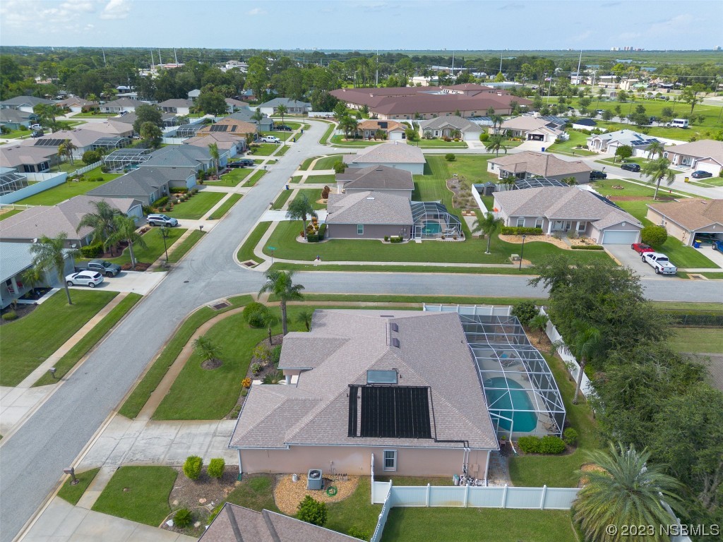 313 Mariners Gate Drive Edgewater, FL 32141 - Photo 51 of 55 an aerial view of a house with a garden