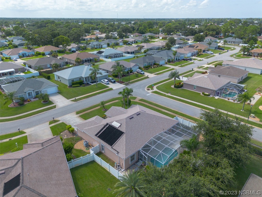 313 Mariners Gate Drive Edgewater, FL 32141 - Photo 52 of 55 an aerial view of a house with a garden