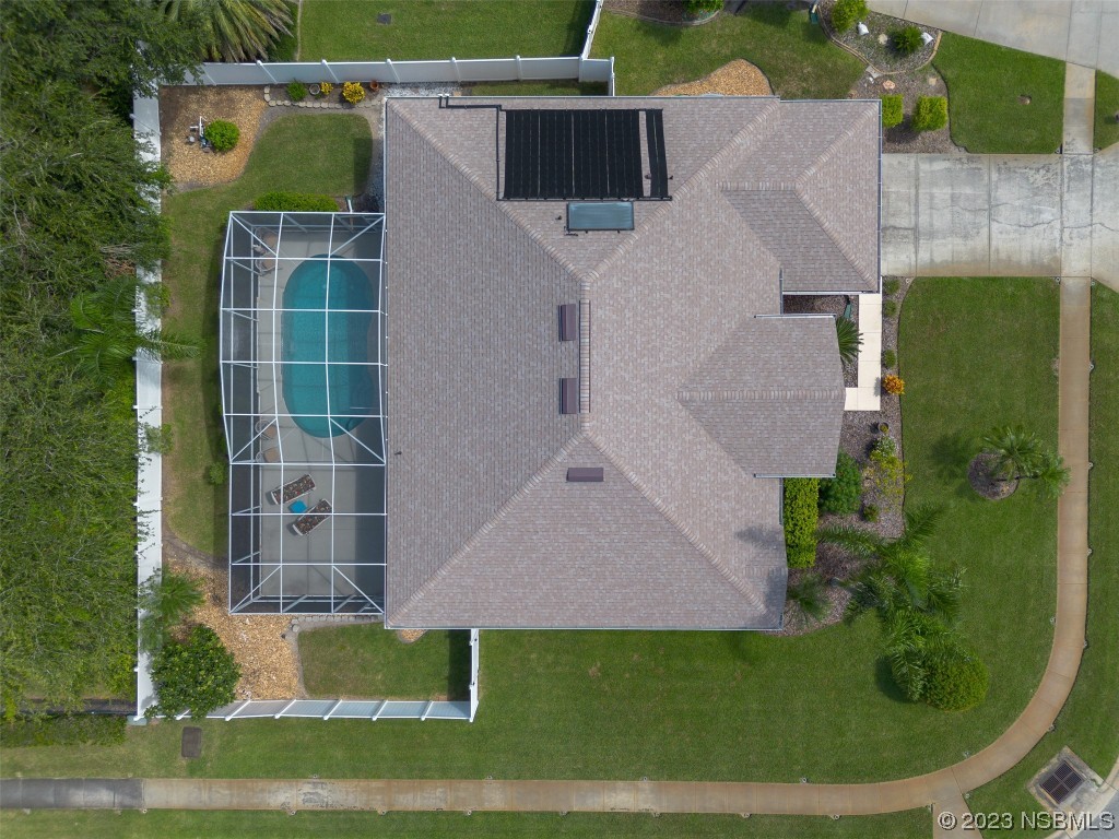 313 Mariners Gate Drive Edgewater, FL 32141 - Photo 55 of 55 an aerial view of a house with a yard