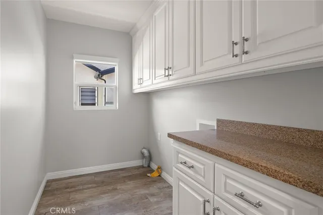 a view of cabinets and window