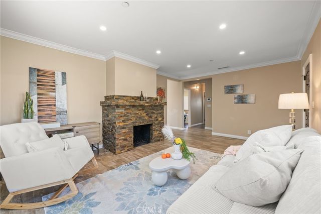 a kitchen with granite countertop stainless steel appliances and a counter space