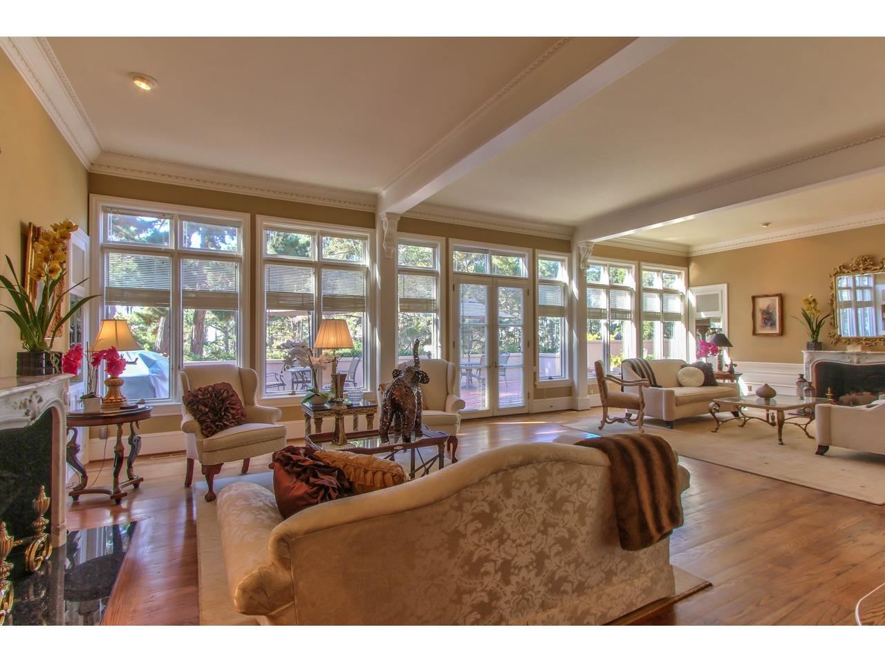 3140 Spruance Road Pebble Beach, CA 93953 - Photo 11 of 70 a living room with furniture and floor to ceiling windows