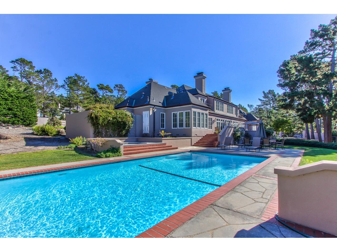 3140 Spruance Road Pebble Beach, CA 93953 - Photo 3 of 70 a view of a house with swimming pool